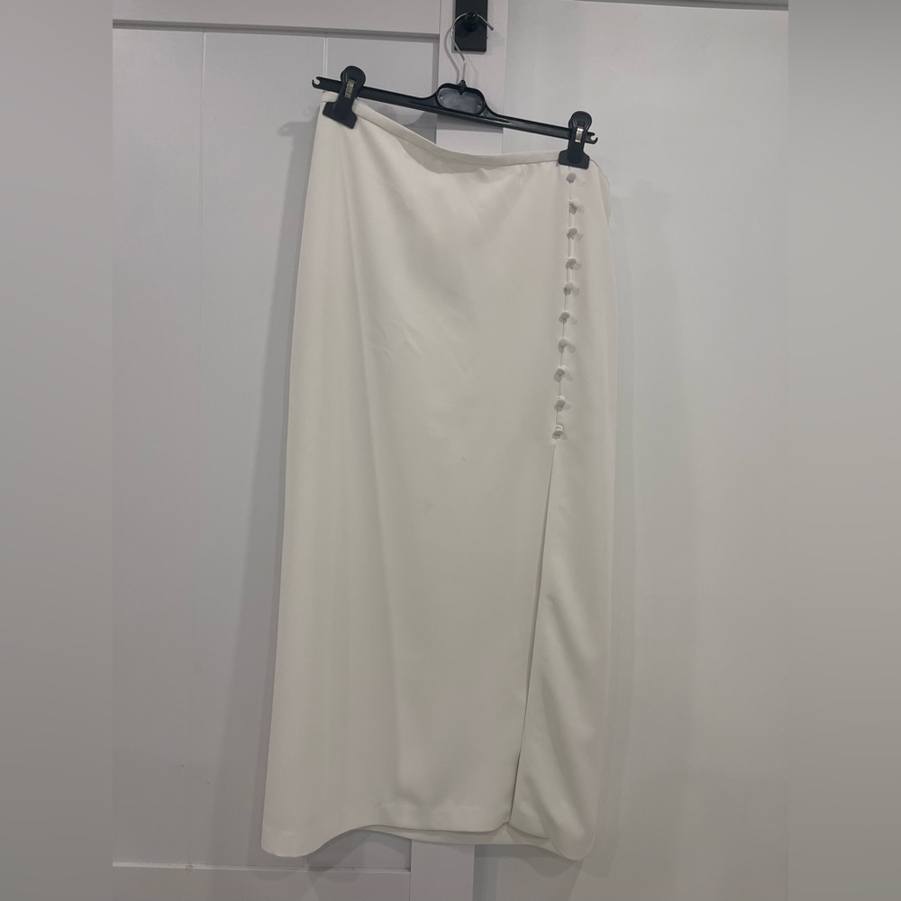 Tristan White long skirt with stylish buttons and side slit
Worn x 2